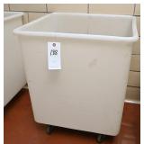 Plastic laundry bins on castors