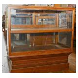 a Fine Country Store Oak Display Case