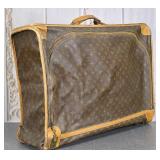 A Vintage Louis Vuitton Suitcase
