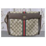 A Gucci Clutch Purse