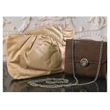 A Pair Of Designer Leather Bags