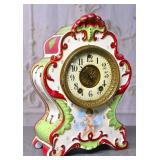 A Gilbert Porcelain Cased Clock