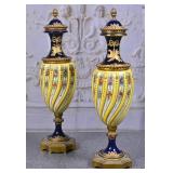 A Pair Of French Garniture Urns