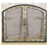 An Arts & Crafts Iron Fire Screen