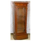 A Large Continental Mahogany Bookcase