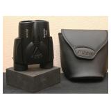 A Pair Of Nikon Binoculars