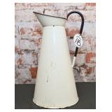 A Large Enamelware Pitcher