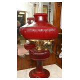 A Fenton Ruby Glass Oil Lamp