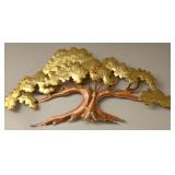 A Copper and Brass Wall Ornament