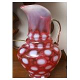 A Fenton Opalescent Pitcher