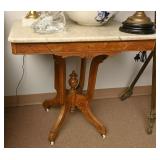 A Victorian Walnut Parlor Table