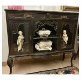 A Victorian Ebonized Side Board