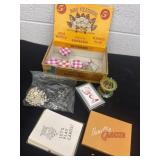 Cigar box with playing cards and jars