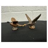 copper pheasants  and goose in flight statues