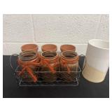 Group of planters and  stone case and mason jars