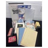 Group of scrapbook paper and trace paper pencil