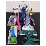 New dog leashes, harness, scoop, waste bags and