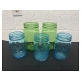 3 blue ball mason jars and green ball mason jars