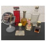 Group of perfumes bottles with mirror