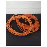 Two orange extension cords with ground and no