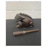 hand-carved wooden frog guiro, a musical