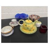 Group of teacups and saucers and trinket box and