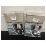 2 new black out curtains