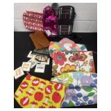 Group of purses and wallets and temp tattoos