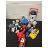 Group of kids toys: stitch, transformer, stars