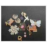 Group of pins and pendants