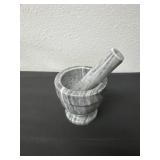 white and gray marble mortar and pestle 4ï¿½