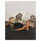 vintage Pair of clamp on roller skates with key