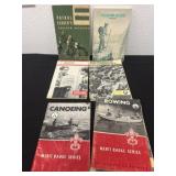 Group of Boy Scout merit badge requirement books