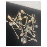 Group of mini, collector and spread spoons