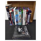 Group of DVDs and  Digimon card game