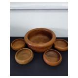 Vintage 12 inch teak bowl with four five inch