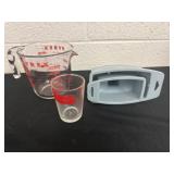 Pyrex measuring cups and funnels.