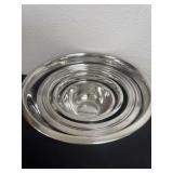 Stainless steel nesting mixing bowls