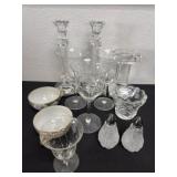 Group of tea cups and glasses and candle holder