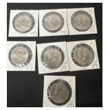 6 Uncirculated Kennedy half dollars