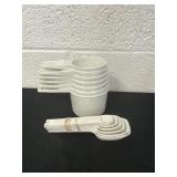 Tupperware measuring cups and spoons
