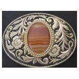 vintage-style western belt buckle featuring a