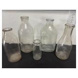 5 glass milk bottles