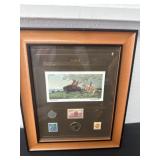 Framed coin stamp display with signed and