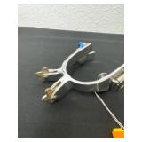 Pair of engraved spurs