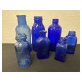 Group of vintage glass bottles