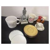 Coffee cups, plate, shakers and mirror pieces