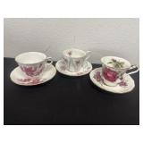 3 teacups and saucers