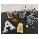 Group of teapot, glass jar, bottle mini clock