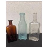 3 Antqiue embossed  bottles
